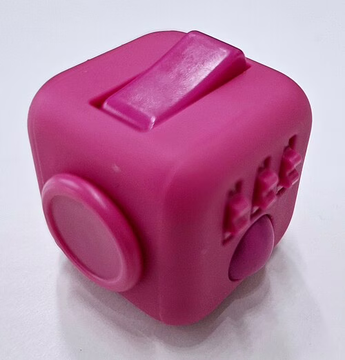 A pink fidget toy